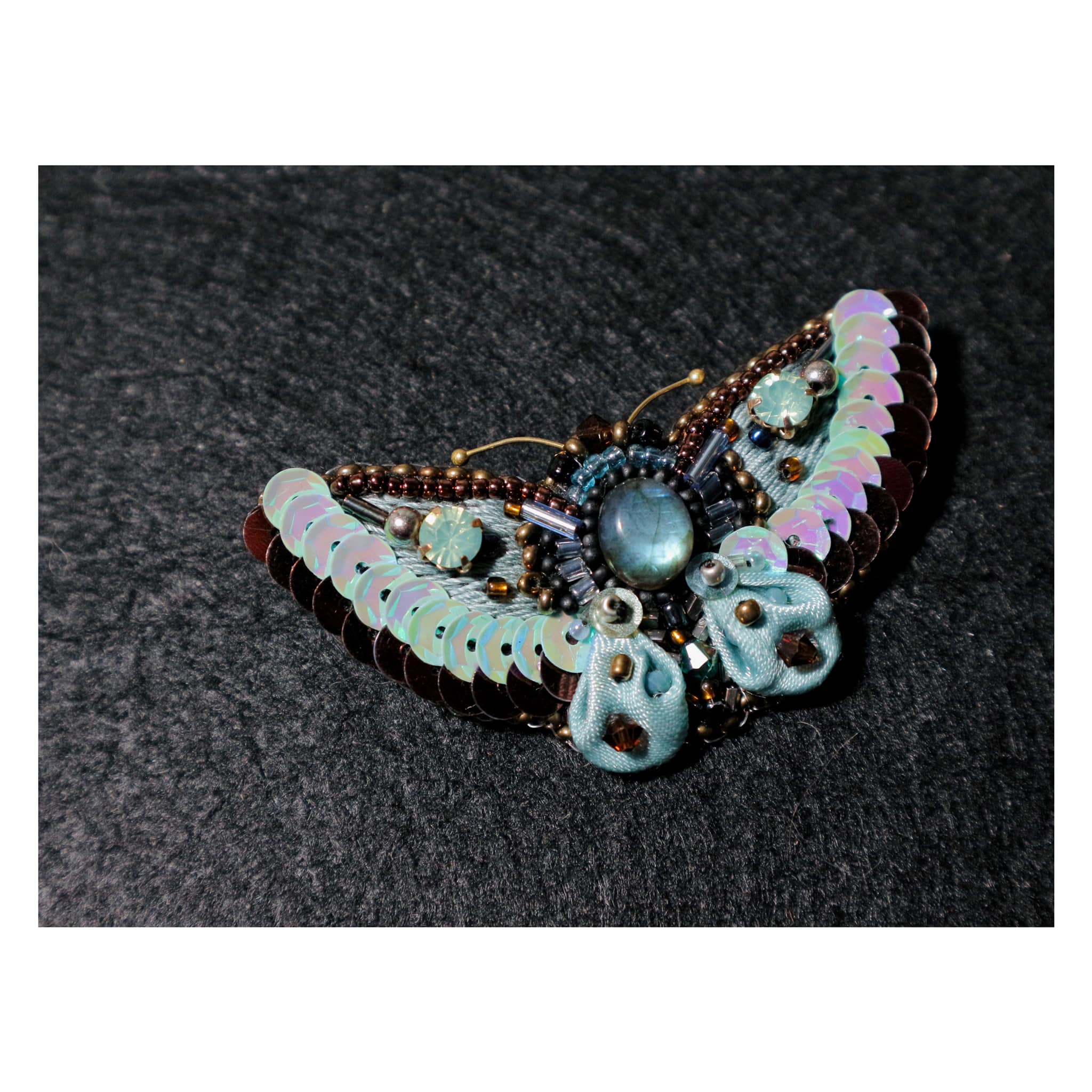 Shimmering moths in bead embroidery technique